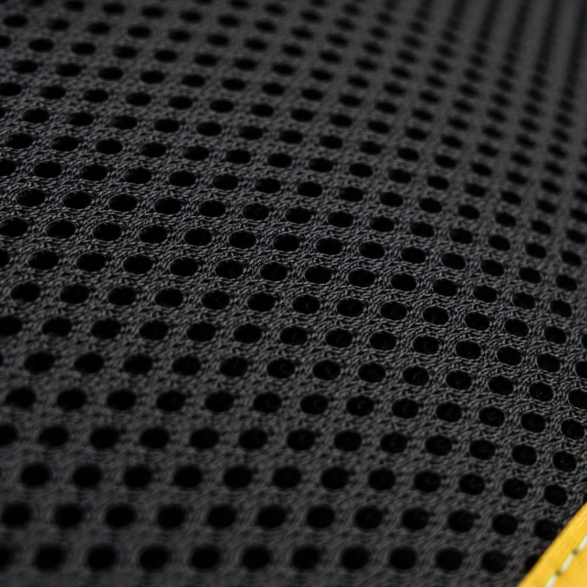 Macro close-up of the breathable mesh back of the PeTidy mitt